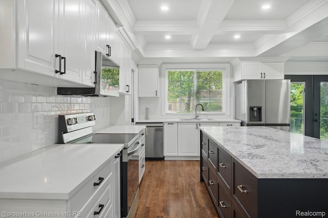 18051 Locherbie Ave, Beverly Hills, MI 48025 - kitchen featuring appliances with stainless steel finishes, a sink, white cabinets, dark brown cabinets, and backsplash