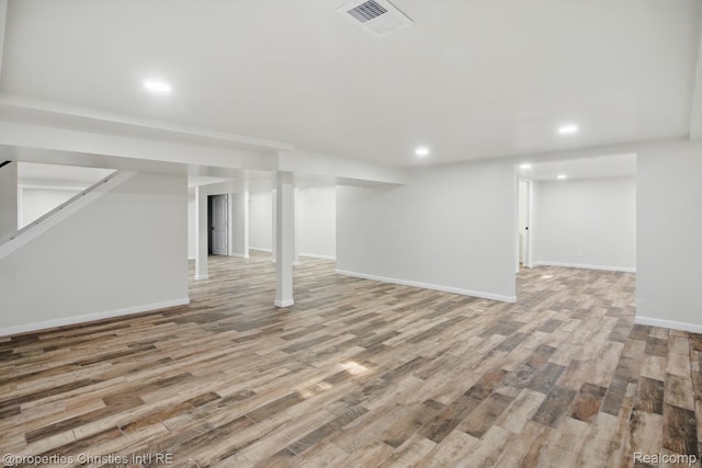 18051 Locherbie Ave, Beverly Hills, MI 48025 - finished basement featuring recessed lighting, wood finished floors, baseboards, and stairway