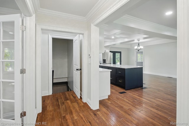 18051 Locherbie Ave, Beverly Hills, MI 48025 - hallway with a chandelier, dark wood-style flooring, crown molding, beamed ceiling, and coffered ceiling