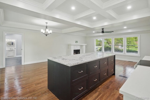 18051 Locherbie Ave, Beverly Hills, MI 48025 - kitchen with open floor plan, a ceiling fan, coffered ceiling, ornamental molding, and a chandelier