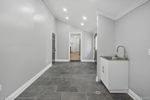 18051 Locherbie Ave, Beverly Hills, MI 48025 - interior space featuring crown molding, a sink, recessed lighting, baseboards, and dark tile patterned flooring