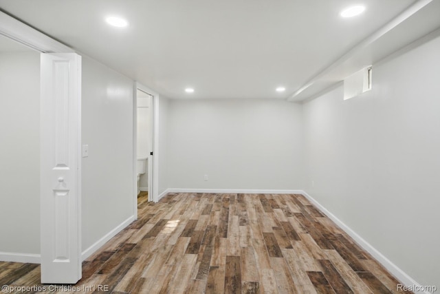 18051 Locherbie Ave, Beverly Hills, MI 48025 - finished below grade area featuring recessed lighting, wood finished floors, and baseboards