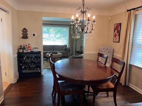 32457 Sheridan Dr, Beverly Hills, MI 48025 - dining room featuring dark wood-style floors, baseboards, and a chandelier