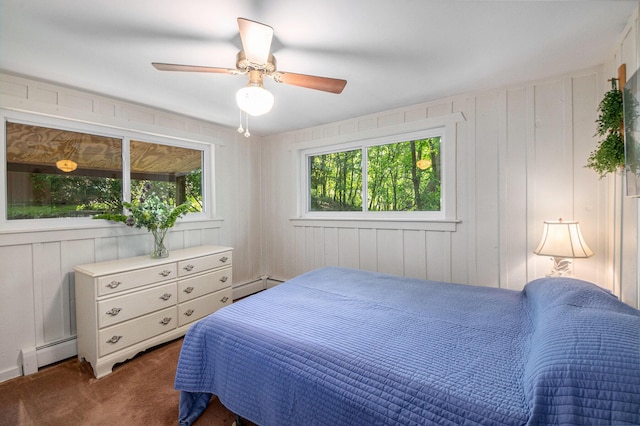 8721 Onandaga Rd, Clarkston, MI 48348 - bedroom with a baseboard radiator, carpet flooring, and a ceiling fan