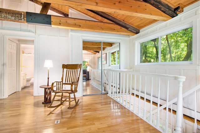 8721 Onandaga Rd, Clarkston, MI 48348 - sitting room featuring an upstairs landing, light wood finished floors, a baseboard radiator, and wood ceiling