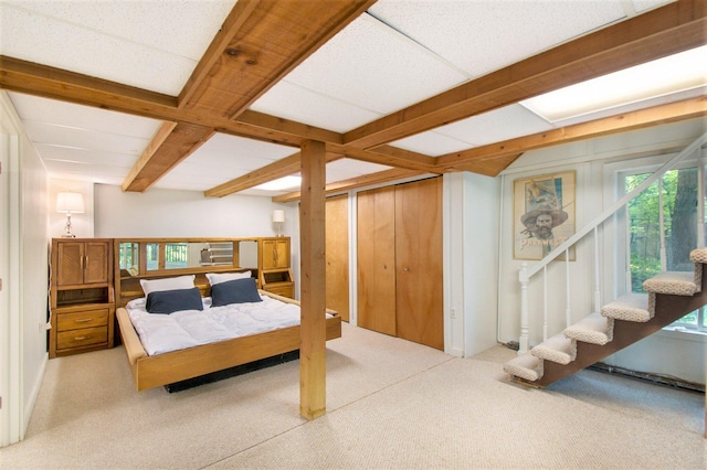 8721 Onandaga Rd, Clarkston, MI 48348 - bedroom with multiple windows, carpet flooring, and beamed ceiling