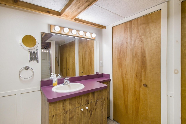 8721 Onandaga Rd, Clarkston, MI 48348 - bathroom with vanity and wainscoting