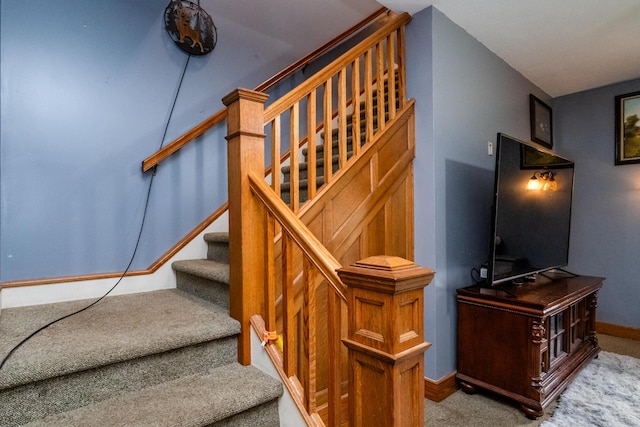 2311 E Glendora Rd, Buchanan, MI 49107 - stairway featuring carpet flooring and baseboards