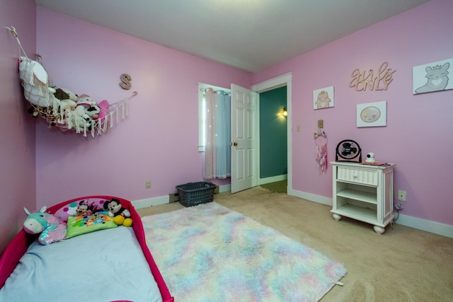 2311 E Glendora Rd, Buchanan, MI 49107 - bedroom with carpet flooring and baseboards