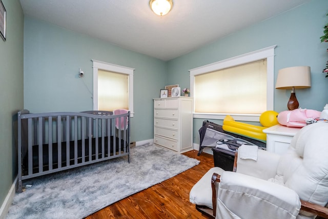 2311 E Glendora Rd, Buchanan, MI 49107 - bedroom with wood finished floors and baseboards