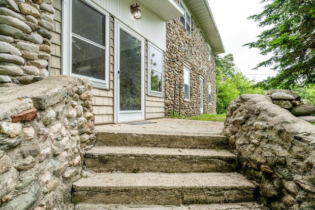 2311 E Glendora Rd, Buchanan, MI 49107 - view of exterior entry featuring stone siding