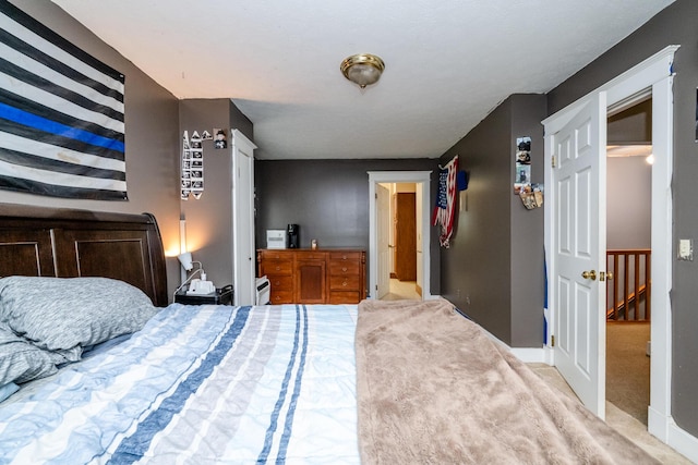 2311 E Glendora Rd, Buchanan, MI 49107 - carpeted bedroom with baseboards