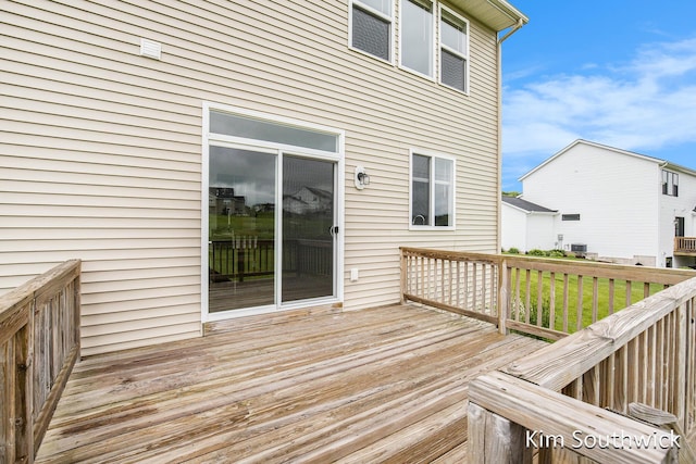 12285 Apple Cart Ln, Lowell, MI 49331 - wooden deck with cooling unit