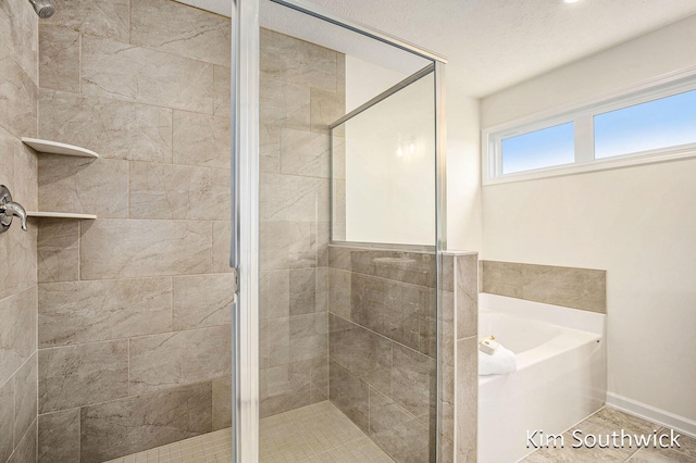 12285 Apple Cart Ln, Lowell, MI 49331 - bathroom featuring a stall shower and a garden tub