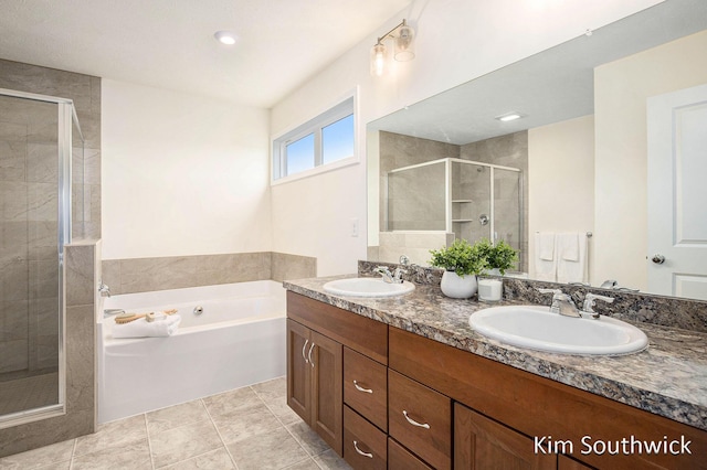 12285 Apple Cart Ln, Lowell, MI 49331 - bathroom featuring a shower stall, double vanity, and a garden tub