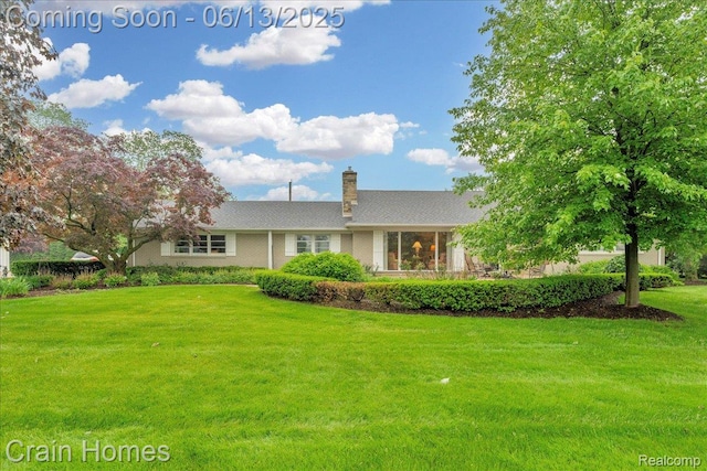 6151 Golfview Dr, Bloomfield Hills, MI 48301 - view of front facade with a front yard and a chimney