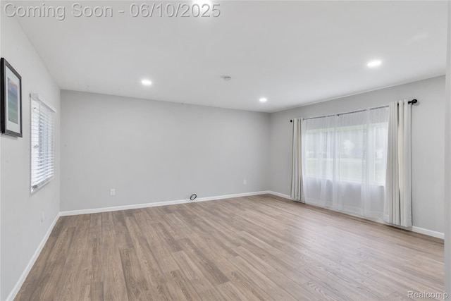2062 Vermont Dr, Troy, MI 48083 - empty room featuring wood finished floors, recessed lighting, and baseboards