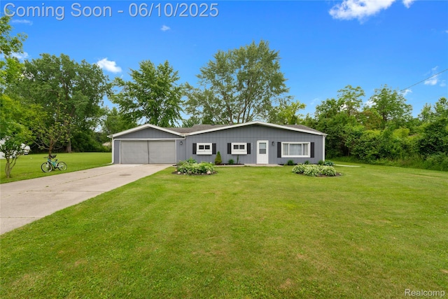 2062 Vermont Dr, Troy, MI 48083 - ranch-style home featuring driveway, an attached garage, and a front lawn