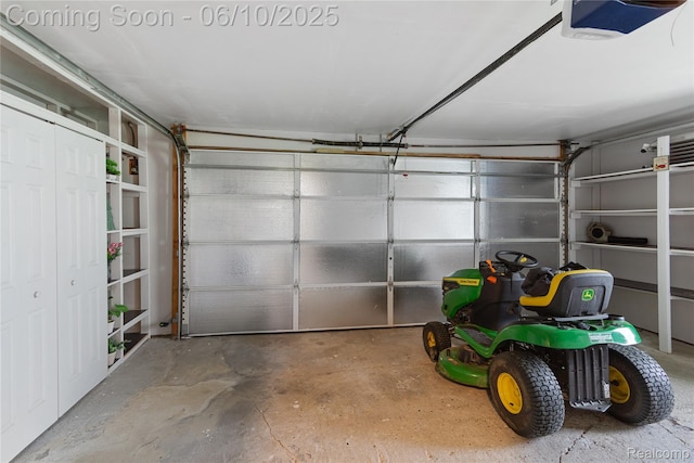 2062 Vermont Dr, Troy, MI 48083 - garage featuring a garage door opener