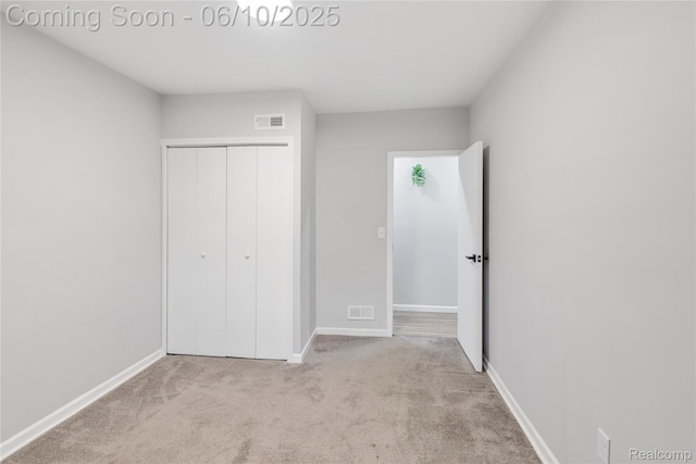 2062 Vermont Dr, Troy, MI 48083 - unfurnished bedroom with carpet, a closet, and baseboards
