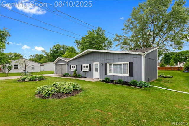 2062 Vermont Dr, Troy, MI 48083 - view of front of home featuring board and batten siding and concrete driveway