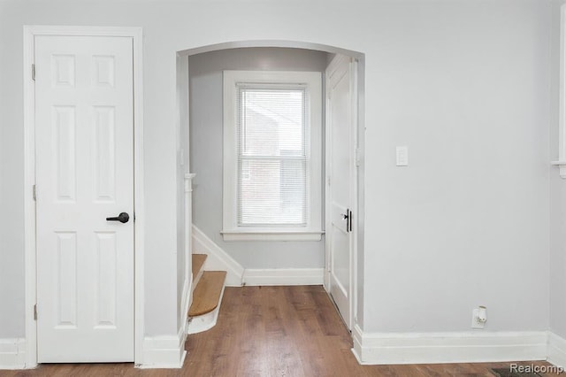 3485 Bedford St, Detroit, MI 48224 - corridor with arched walkways and wood finished floors