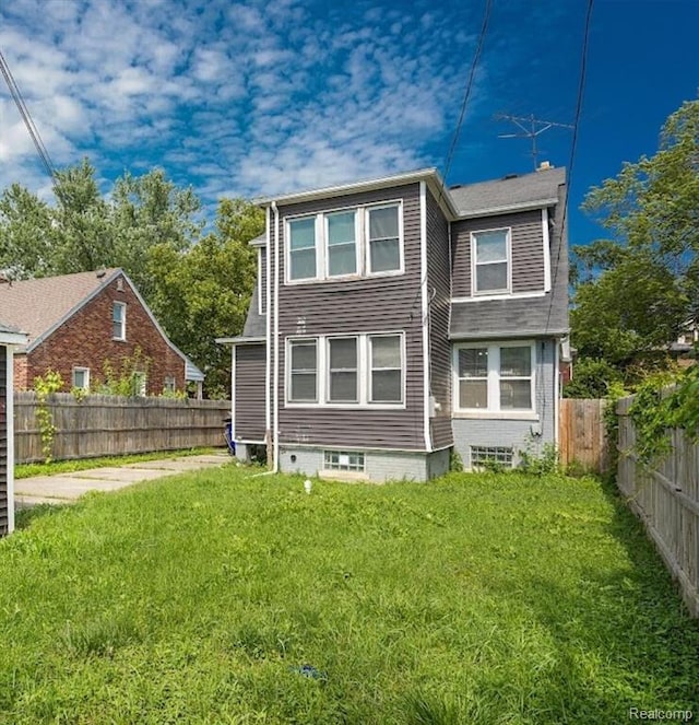 3485 Bedford St, Detroit, MI 48224 - rear view of property with a fenced backyard