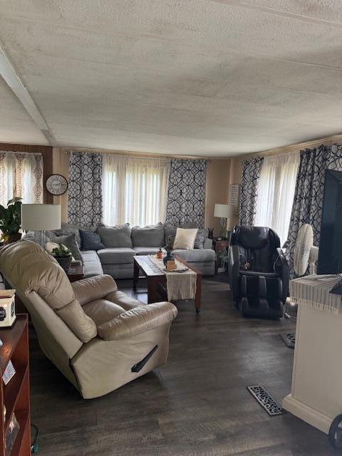 583 S Mcintosh Ln, Muskegon, MI 49442 - living room featuring wood finished floors