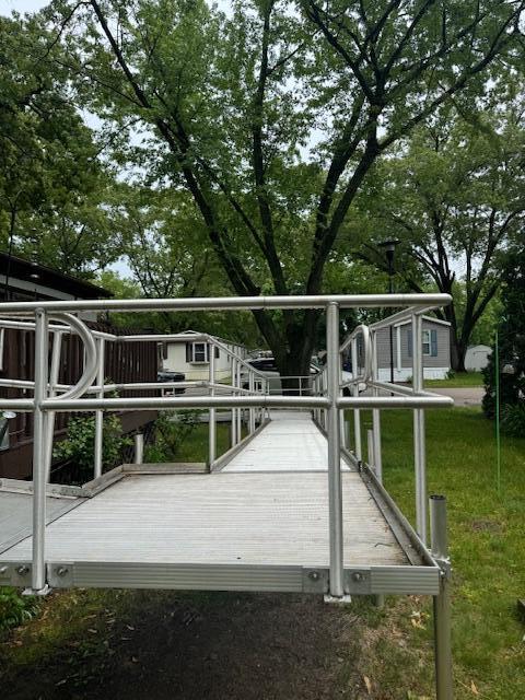 583 S Mcintosh Ln, Muskegon, MI 49442 - dock with a lawn