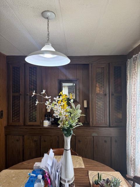 583 S Mcintosh Ln, Muskegon, MI 49442 - dining room with wood walls