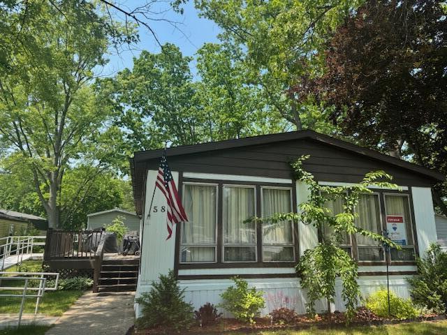 583 S Mcintosh Ln, Muskegon, MI 49442 - view of front of home featuring a deck