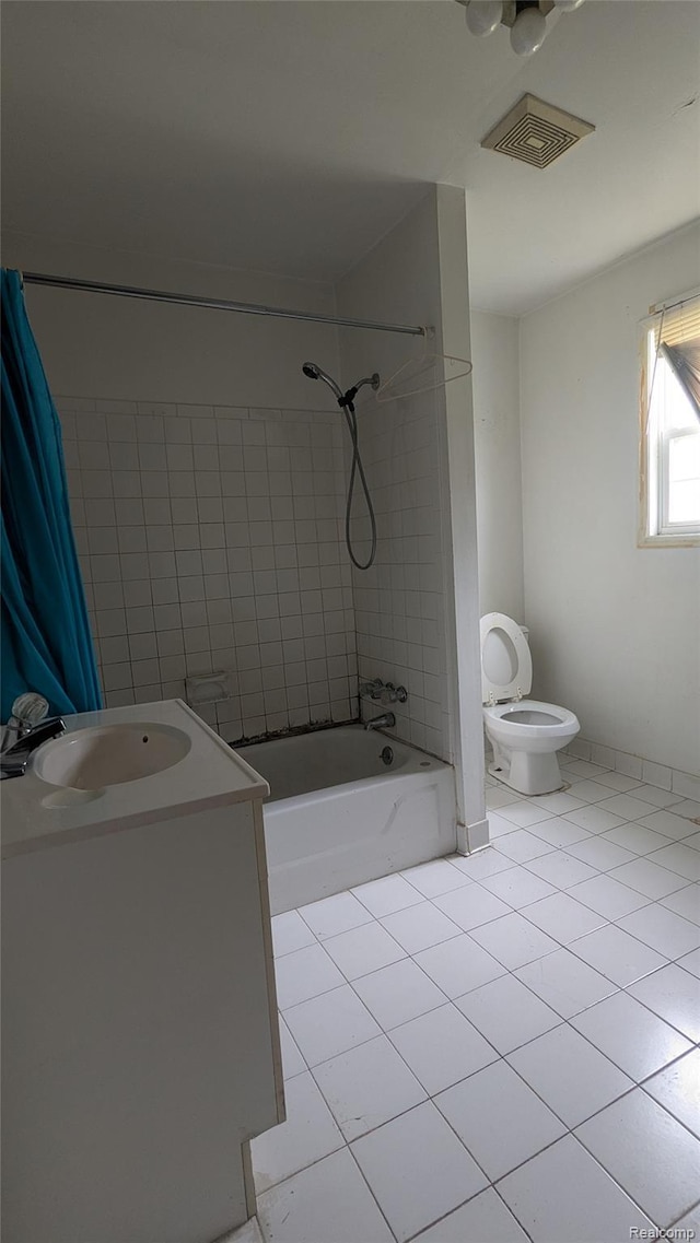 551 Nebraska Ave, Pontiac, MI 48341 - bathroom featuring tile patterned flooring, shower / tub combo, toilet, and vanity