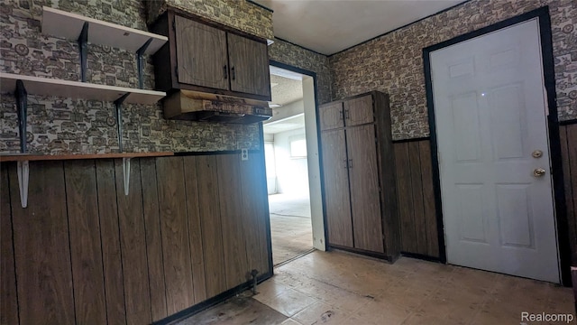 551 Nebraska Ave, Pontiac, MI 48341 - kitchen with open shelves, wooden walls, and wainscoting