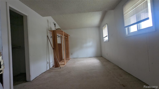 551 Nebraska Ave, Pontiac, MI 48341 - unfurnished bedroom with a textured ceiling and light carpet