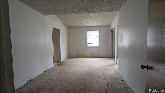 551 Nebraska Ave, Pontiac, MI 48341 - unfurnished room with light colored carpet and a textured ceiling