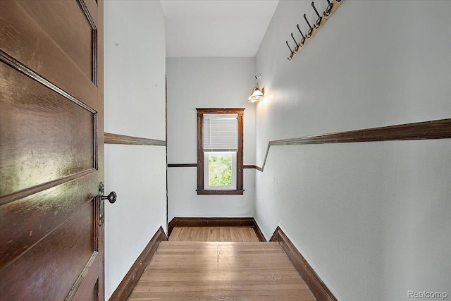 2160 Concord St, Detroit, MI 48207 - stairway featuring wood finished floors and baseboards