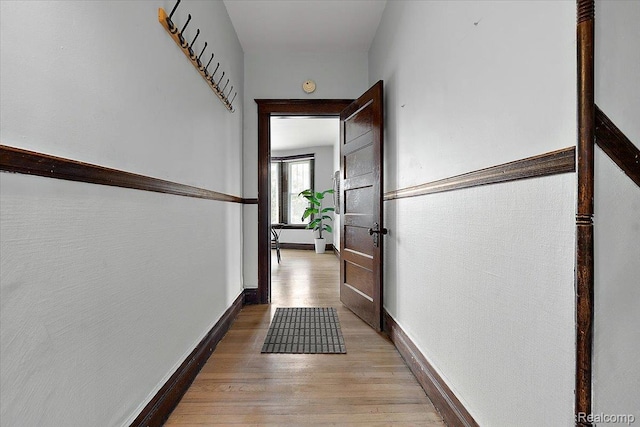 2160 Concord St, Detroit, MI 48207 - hallway with light wood finished floors and baseboards