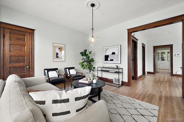 2160 Concord St, Detroit, MI 48207 - living room featuring light wood-style floors and baseboards