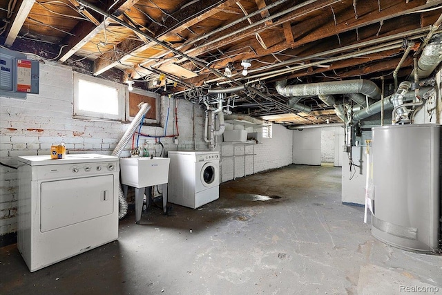 2160 Concord St, Detroit, MI 48207 - below grade area featuring washing machine and dryer and water heater