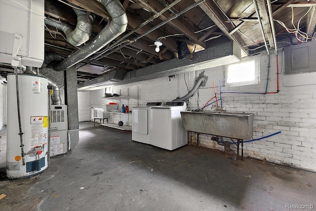 2160 Concord St, Detroit, MI 48207 - below grade area with gas water heater, washing machine and dryer, and electric panel