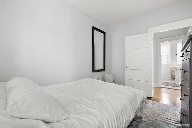 2160 Concord St, Detroit, MI 48207 - bedroom featuring wood finished floors