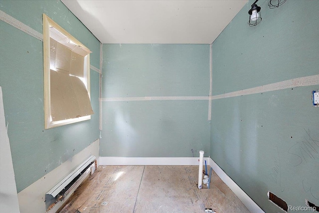 2160 Concord St, Detroit, MI 48207 - empty room with a baseboard heating unit