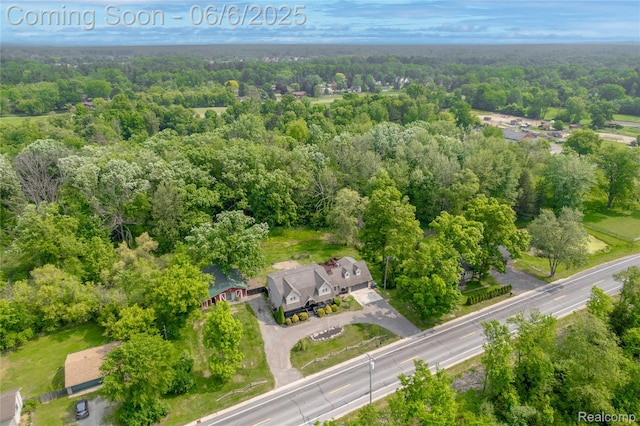 12631 9 Mile Rd, South Lyon, MI 48178 - aerial view of a heavily wooded area