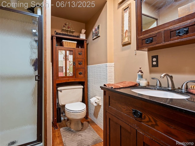 27904 Milton Ave, Warren, MI 48092 - bathroom with vanity, a stall shower, and wood finished floors