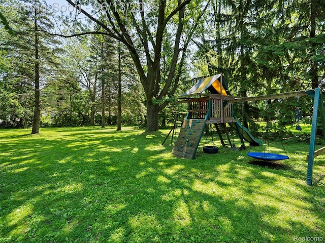 27904 Milton Ave, Warren, MI 48092 - view of grassy yard with a playground