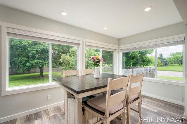 6810 Pierce St, Allendale, MI 49401 - dining room featuring baseboards, light wood-style floors, and recessed lighting