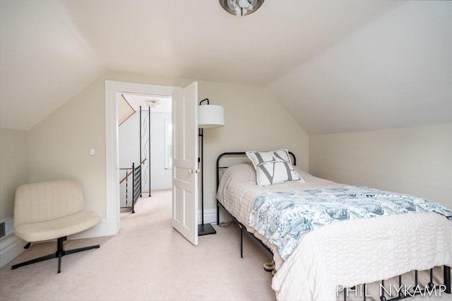 6810 Pierce St, Allendale, MI 49401 - carpeted bedroom featuring lofted ceiling