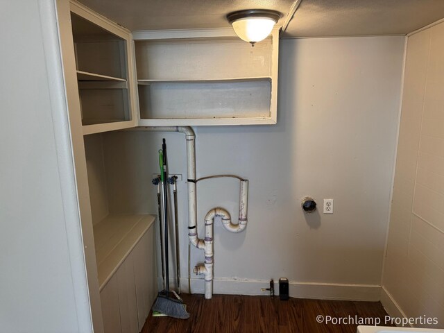 1257 3rd St, Muskegon, MI 49441 - laundry area with wood finished floors