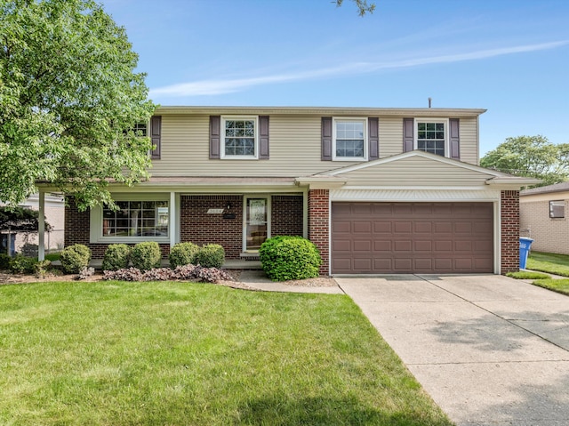 3604 Pall Dr, Warren, MI 48092 - traditional home featuring driveway, brick siding, a front yard, and an attached garage