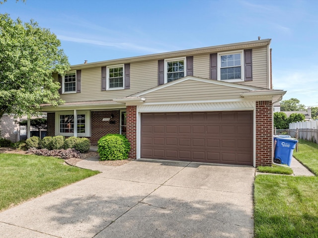3604 Pall Dr, Warren, MI 48092 - view of front of home with concrete driveway, brick siding, and a garage